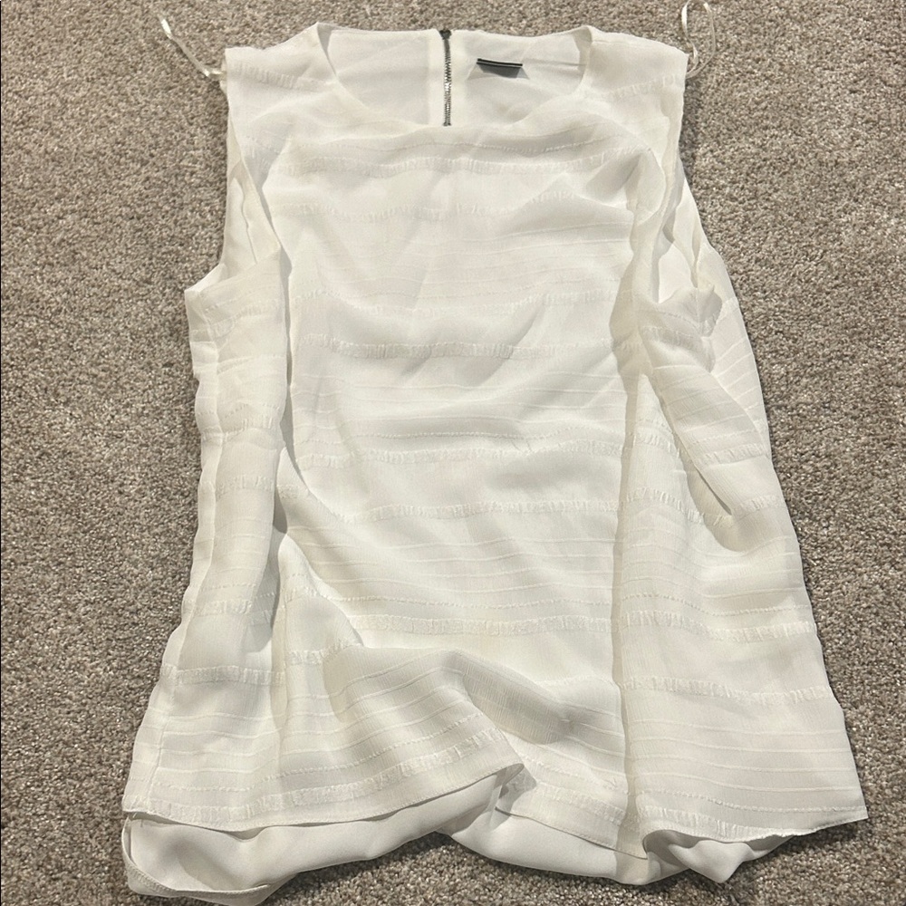 NWOT Elegant White Sleeveless Top from Paris